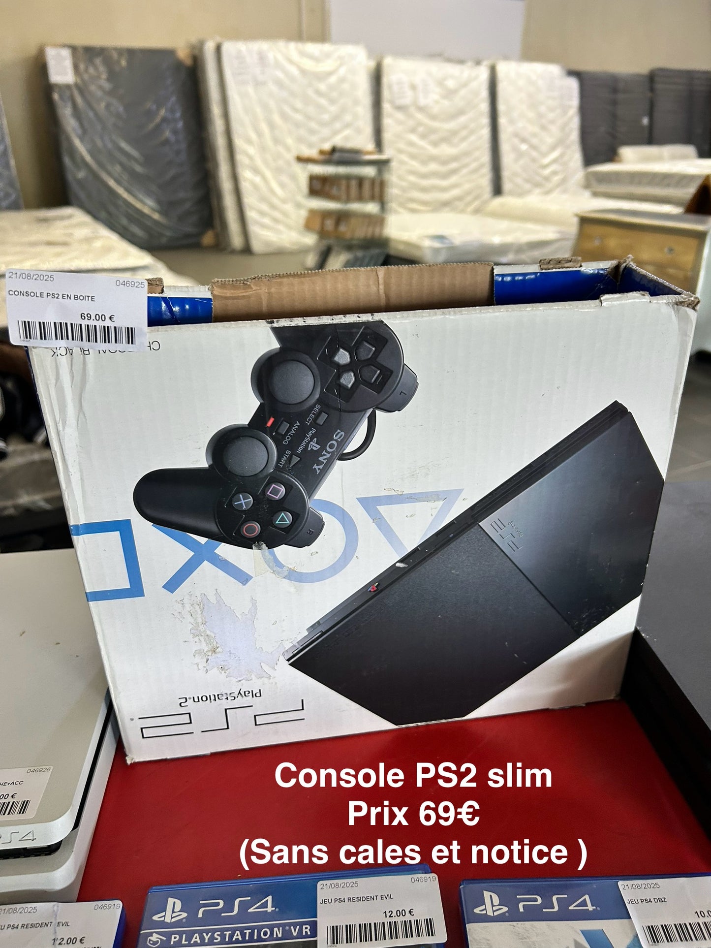 Console PS2 slim en boîte