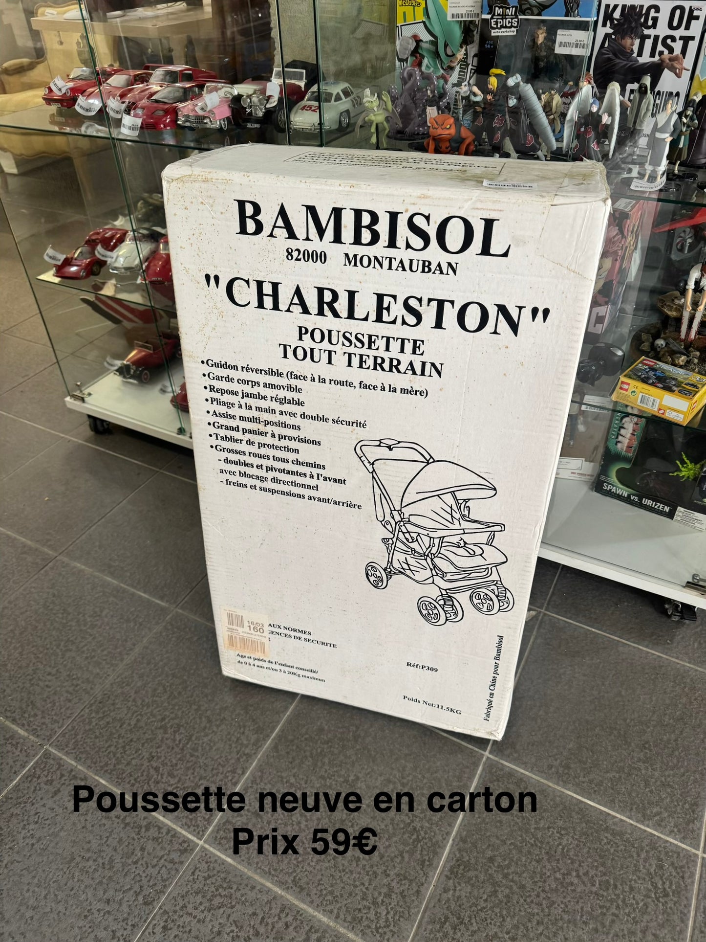 Poussette neuve en carton 065764